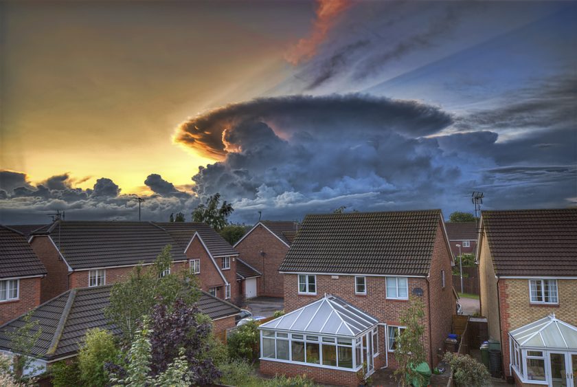 A massive cumulonimbus in the distance. Awesome picture. Photo via Matador Network.