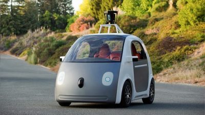 Google's self-driving car is cruising down the road.