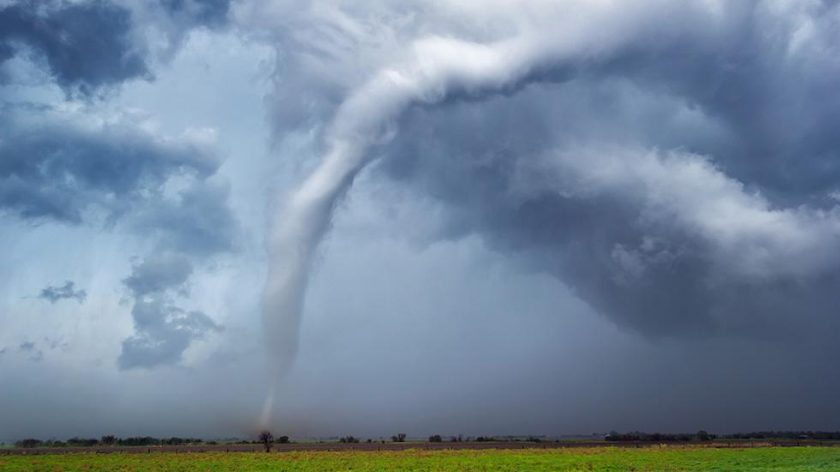 Tornadoes are only considered tornadoes if they are in contact with both the cloud and the ground. Until they touch down, they can be considered cyclones or funnel clouds.