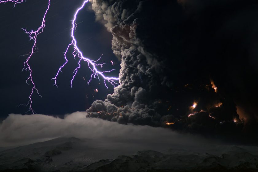 Volcano lightning, or “dirty thunderstorms,” occur when volcanic ash, ice particles, and rocks collide in a volcanic plume, causing static and, eventually, lightning. This photo was taken during the 2010 eruption of the Icelandic volcano Eyjafjallajökull. Photo via Volcano World.