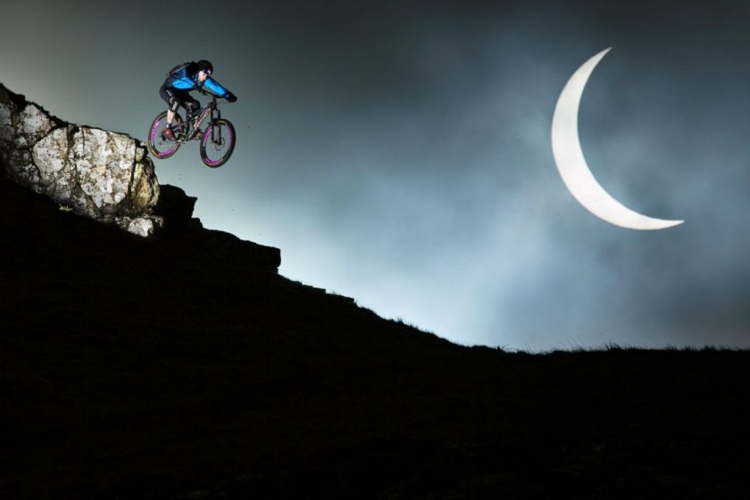 Danny MacAskill drop off during the solar eclipse at the Quirrang on the Isle of Skye, UK. Photo: Rutger Pauw / Red Bull Content Pool.