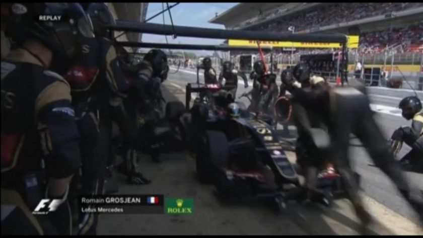 Lotus' front jackman managed to hold the jack in place as the car overshot the pitbox. Photo: Screen grab from Formular1.com video.