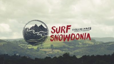 The logo for Surf Snowdonia National Park features a unique design inspired by the surfing culture in the area.