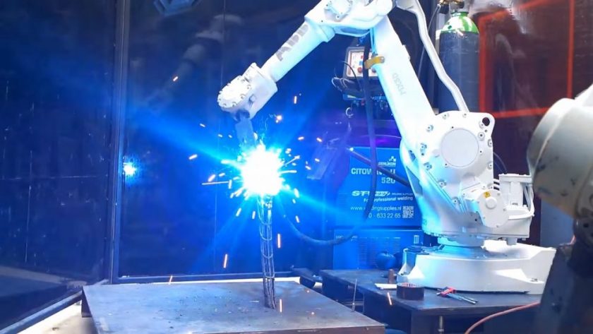 The Arc Bike frame being 3D printed with molten steel. Photo: Screenshot from video.