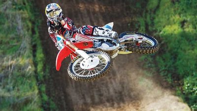 Ashley Fiolek jumping a dirt bike