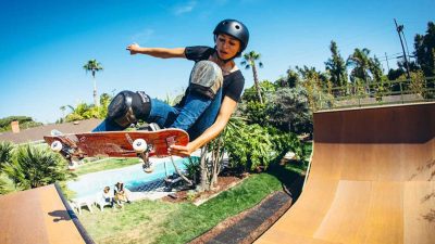 Lizzie Armanto skateboarding on a halfpipe
