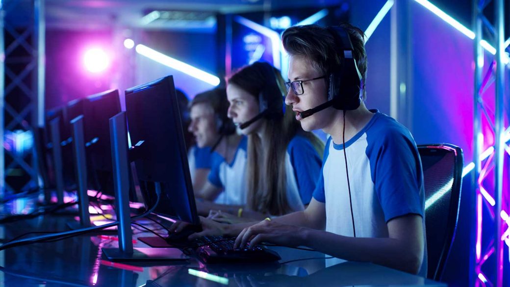 A team of four pro gamers competing in an eSports competition