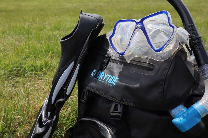 Top pocket of the DryTide 50L waterproof backpack featuring a rainproof zipper