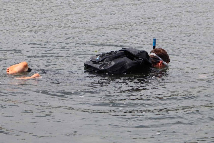 Snorkelling while carrying the DryTide 50L waterproof backpack