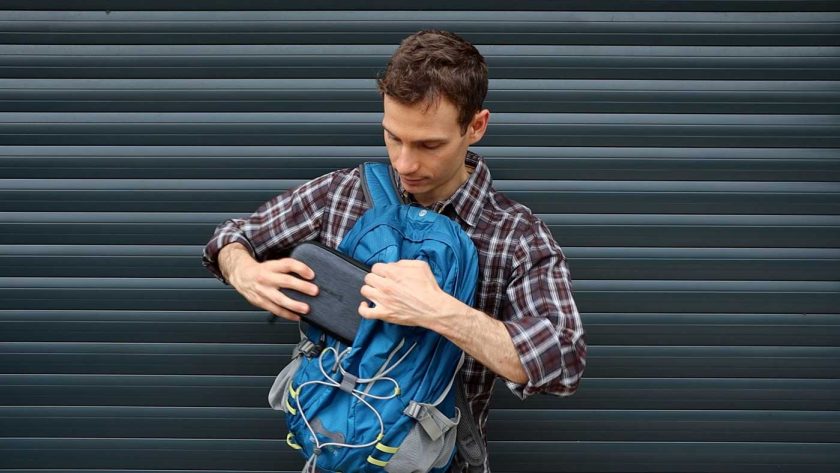 Packing the tech organiser into a backpack pocket