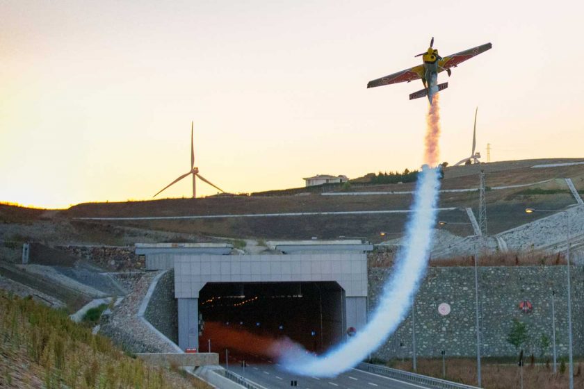Dario Costa pulling up into a celebratory loop after successfully piloting an aeroplane through a tunnel