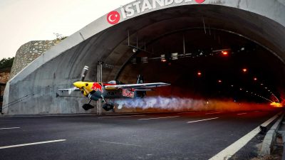 Dario Costa piloting an aeroplane through a tunnel