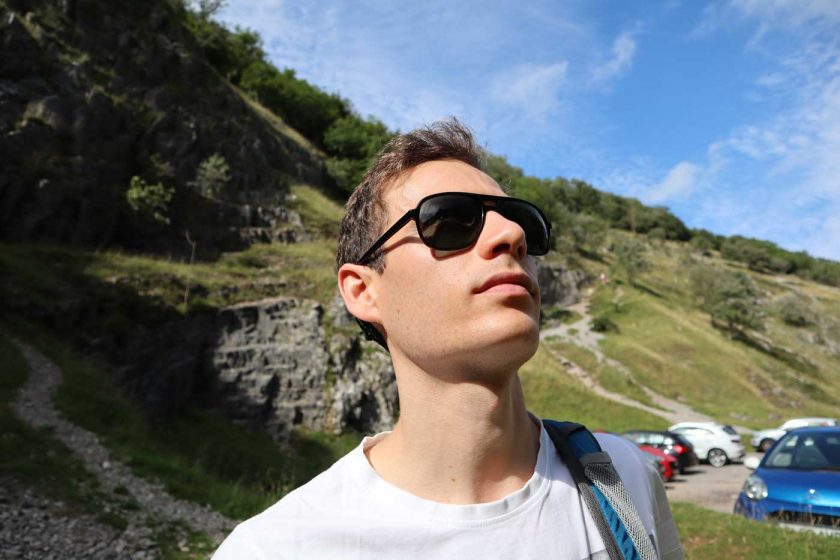 Looking at a rock climbing route in Cheddar through the Vallon Howlin’ sunglasses