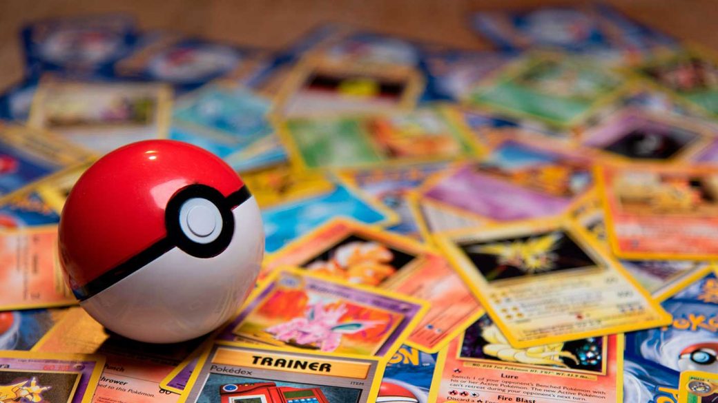 Set of Pokémon trading cards with Pokéball TCG accessory