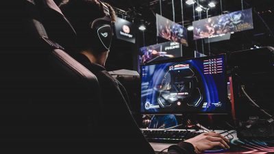 Pro gamer using an ergonomic gaming chair and other healthly gaming habits to play video games more healthily