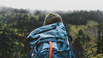 Backpacker visting a mountain forest