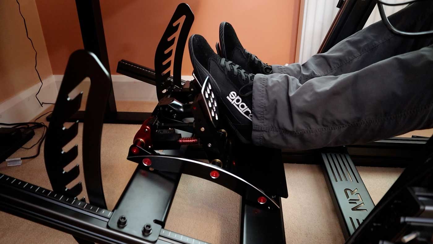 Next Level Racing F-GT Elite pedal deck side view with Fanatec ClubSport Pedals V3