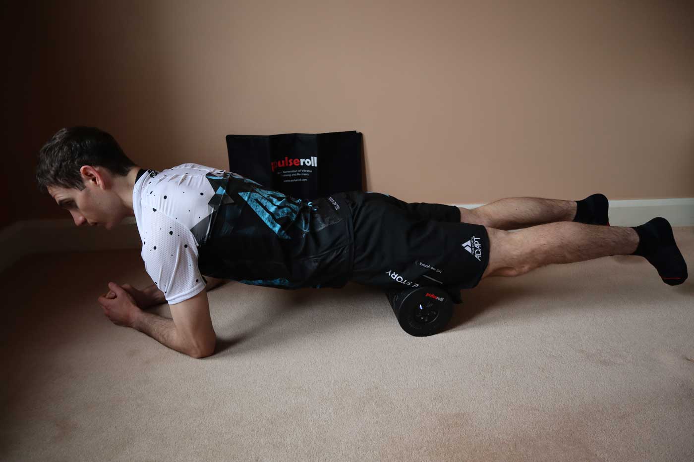 Working two limbs at a time with the Pulseroll Vibrating Foam Roller Pro