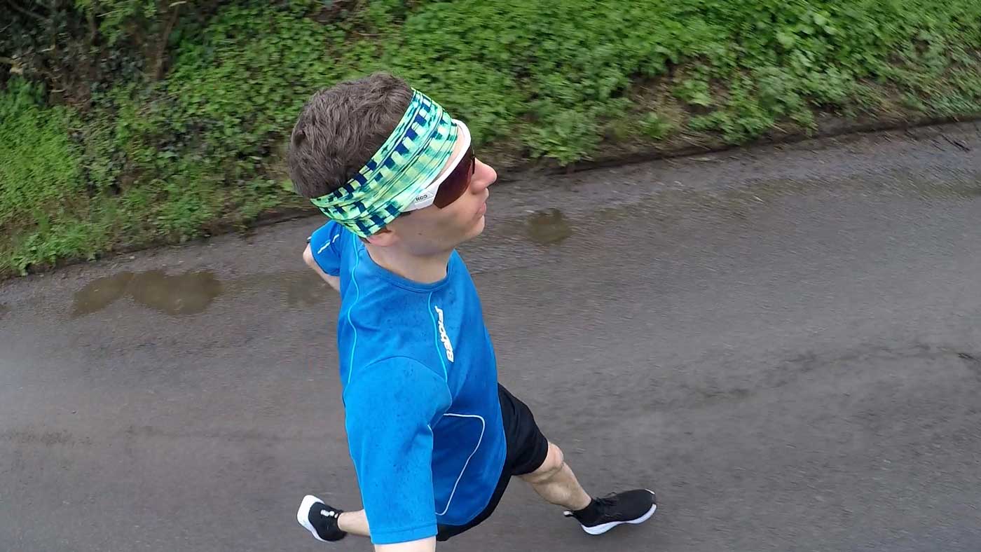 Side view of the Loom Footwear waterproof sneakers while running in the rain