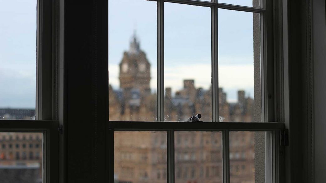 View of Edinburgh skyline through a window